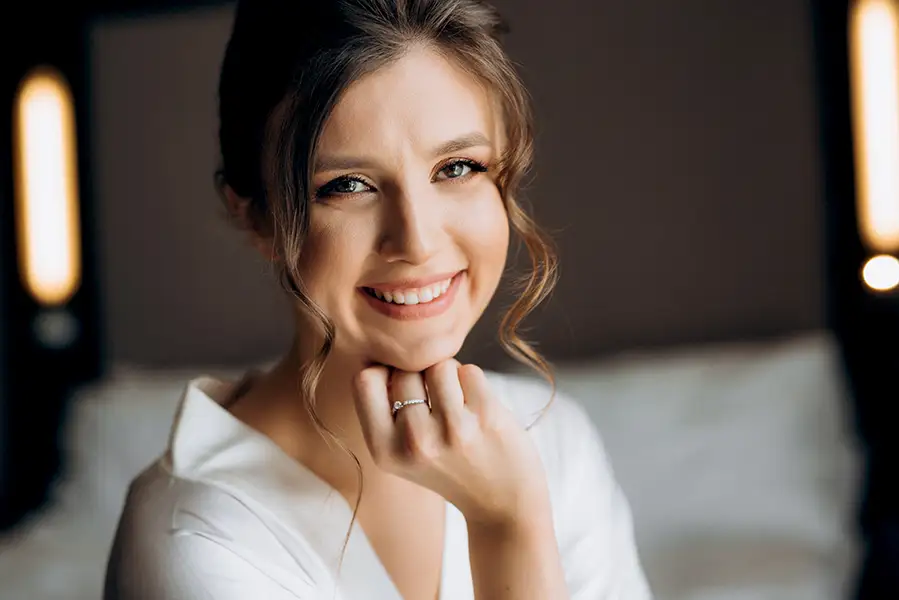  Confident adult woman with smooth glowing skin and a relaxed smile, representing beauty, confidence, and personalized spa care